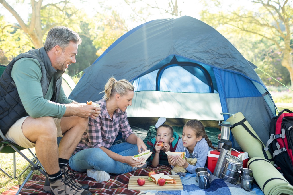 Family camping in a tent